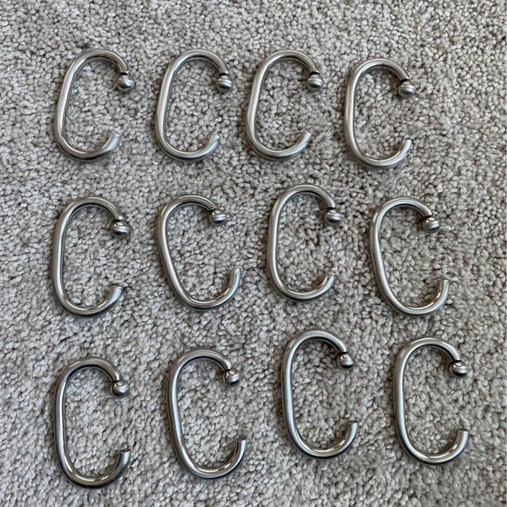 Brushed nickel shower curtain rings